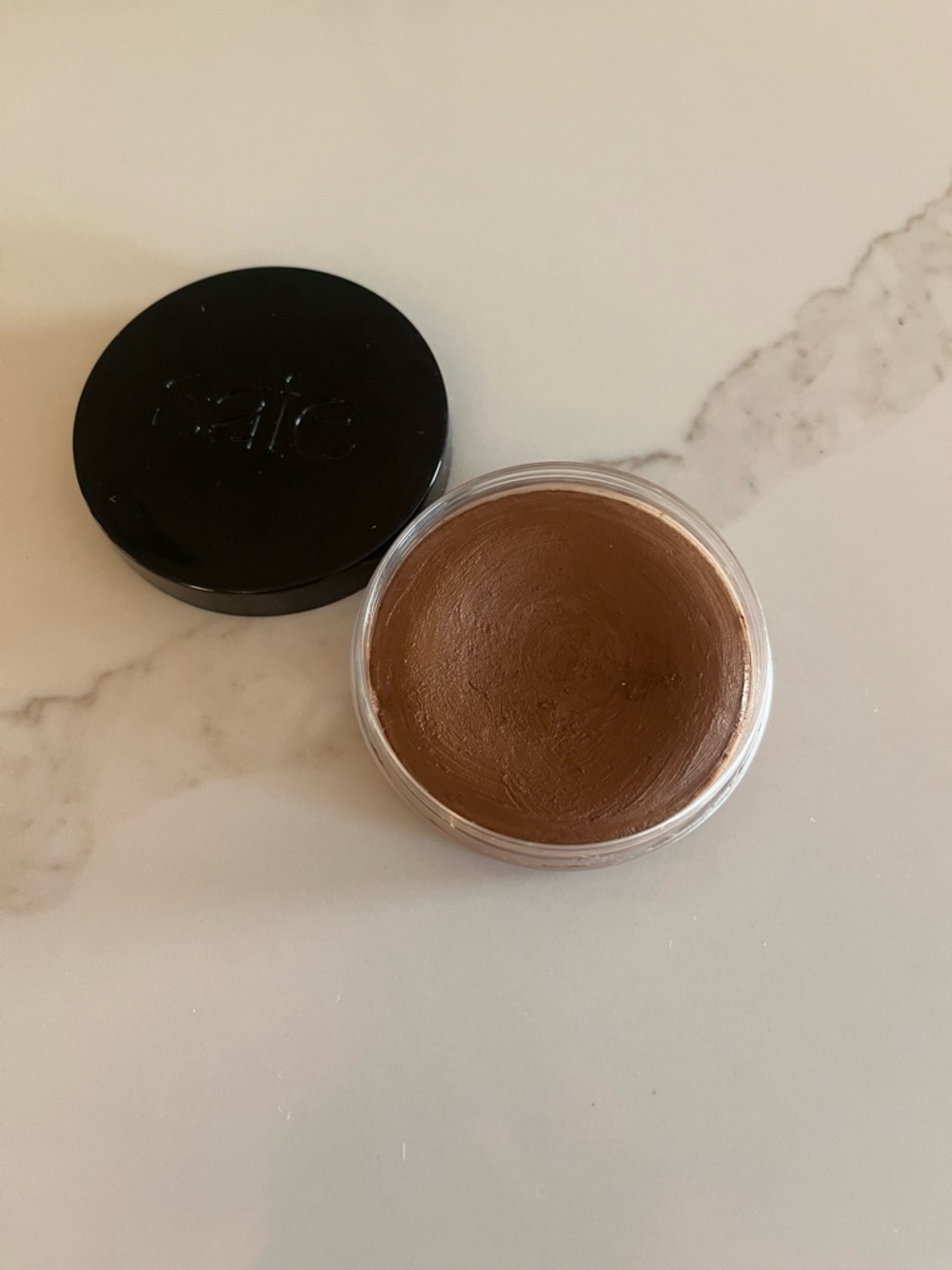 Saie sun melt natural cream bronzer in shade tan bronze